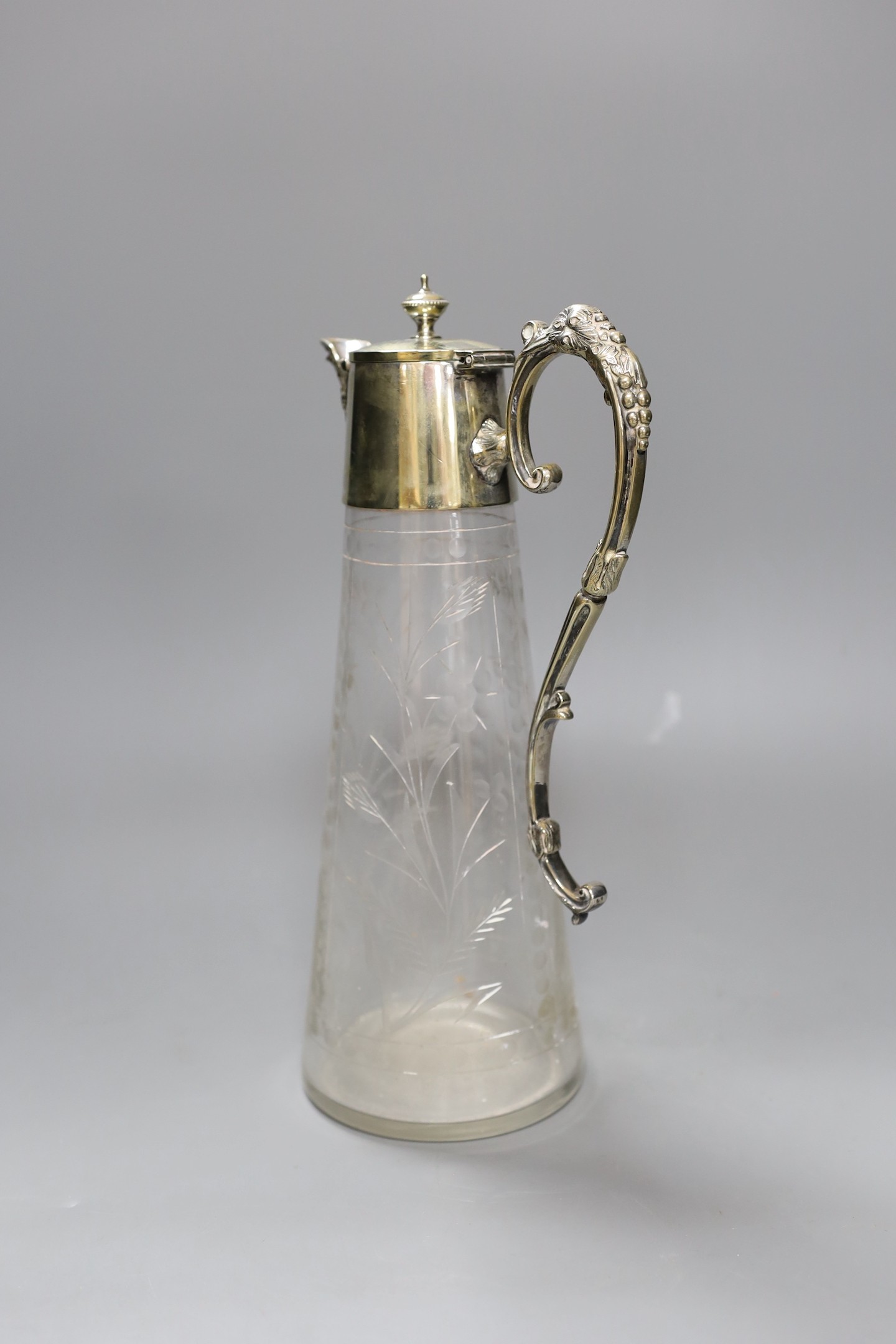 An electroplate mounted cut glass claret jug, 30cm